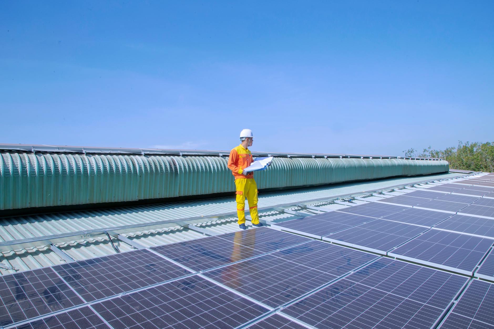 Solar technician inspecting a roof to determine if a property is not suitable for solar panel installation
